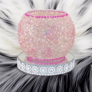 Pink crushed diamond bubble vase with black & white fur background