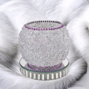 Purple decor vase against white fur background. The perfect chic office decor!